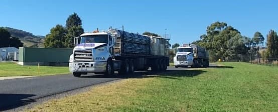 Delivery trucks on site for a Logistix AU project cargo shipment